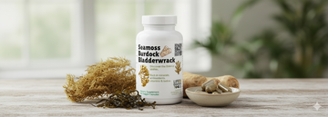 Supplement bottle labeled 'Seamoss Burdock Bladderwrack' on a wooden surface with natural elements.