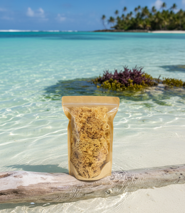 Packaged product on a log with a tropical beach and clear water in the background