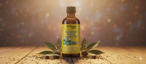 Bottle of Jamaican Black Castor Oil with leaves on a wooden surface